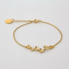 A delicate trail of Forget Me Knot Flowers have bloomed to create this delicate bracelet! Alex Monroe Jewellery is inspired by nature and handcrafted in his London Workshop. Specification Material: 22ct Yellow Gold Plate and Sterling Silver Flowers - 2.7 cm Chain Length - 16.5 cm - 19.5 cm (6.5" - 7.7") Product Code: FFB1 About Alex Monroe Alex Monroe jewellery is synonymous with a very British sense of style. Feminine, delicate and quirky, but above all consistently wearable. A much-loved brand Not Bracelet, Gold Knot Bracelet, Gold Earrings For Kids, Earrings For Kids, Forget Me Not Flowers, Plate Flowers