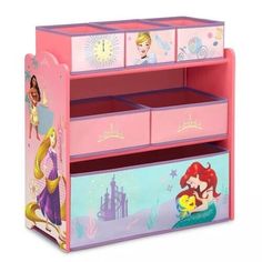 a pink toy chest with princesses on the top and bottom drawers, both open