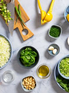 the ingredients are laid out on the table to make this salad, including broccoli and peas