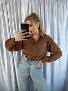 - Vintage cowboy style brown women's shirt, western style blouse - Good vintage condition  - TAG SIZE: 40 - Fabric information: 95% polyester, 5% elastane Estimated to fit XS-S-M-L  based on your desired fit. Measurements (laying flat): - Shoulders (back): 47 cm - Length: 75 cm - Sleeve: 57 cm - Armpit to armpit: 54 cm Vintage clothes may come with minor flaws due to pre-loved wear. But most importantly it is a one-of-a-kind piece with its own character. By shopping secondhand you're giving a se Brown Workwear Tops With Button Closure, Brown Button Closure Tops For Work, Brown Tops With Button Closure For Work, Brown Long Sleeve Shirt With Pockets, Brown Button-up Top With Pockets, Brown Collared Top With Button Closure, Brown Button-up Blouse, Brown Button-up Blouse With Button Closure, Brown Collared Tops With Pockets