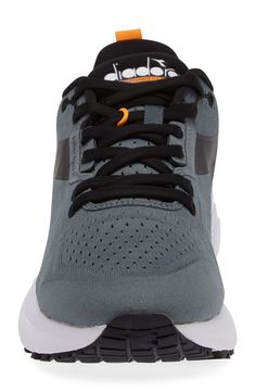 Keep upping your endurance in this modern running shoe that's packed with performance technology. Cushioning: absorbs impact and distributes weight for consistent, buoyant comfort under each step Lace-up style Textile and synthetic upper/textile lining/rubber sole Imported Dynamic Gray Trail Running Shoes For Jogging, Dynamic Gray Running Shoes For Marathon, Fade-resistant Gray Trail Running Shoes, Gray Fade-resistant Trail Running Shoes, Breathable Gray Running Shoes For Marathon, Gray Dynamic Running Shoes For Training, Dynamic Gray Running Shoes For Training, Gray Running Shoes With Ortholite Insole, Gray Running Shoes With Shock Absorption