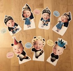 a group of stickers with babies wearing hats and crowns on top of wooden floor