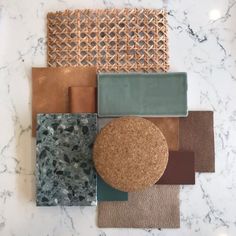 different colors and shapes of tile on a marble counter top