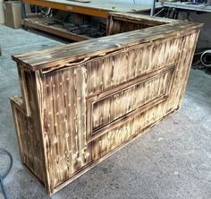 an old wooden cabinet is being worked on