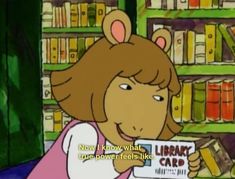 a cartoon girl holding up a library card in front of bookshelves and shelves