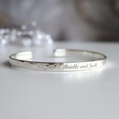 If you're wondering what to get a future Daughter in Law, here's a very memorable gift. The bracelet comes personalized with any words, symbols or your handwriting.  - Open hammered Sterling Silver bracelet - The bracelet can be engraved with any text, up to 90 characters on each side.  - Many fonts and symbols (and also handwriting) available  If you want to see the draft of the engraving, please send me the text and font via message. I will prepare and send you the draft. You can any text, her Silver Engraved Bracelets For Anniversary, Engraved Bangle As A Gift, Engraved Sterling Silver Bracelet For Gift, Engraved Sterling Silver Bracelet For Personalized Gift, Classic Engraved Sterling Silver Bracelet For Anniversary, Customizable Classic Jewelry For Wedding Gift, Silver Bangle Jewelry For Wedding Gift, Personalized Sterling Silver Bracelet For Anniversary, Personalized Sterling Silver Round Bracelet For Anniversary