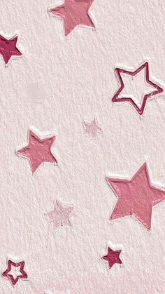 the stars are pink and white on the paper sheeted wall, which has been drawn with crayon pencils