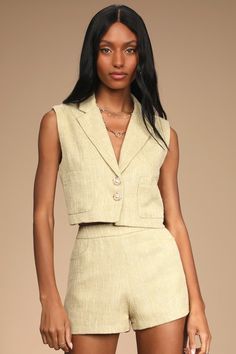 Never worry about looking stylish when you have the Lulus Perfect Company Olive Tweed Sleeveless Cropped Blazer! Medium-weight tweed shapes this blazer with a collared neckline, notched lapels, and a sleeveless bodice with two front patch pockets. A double faux-pearl button closure (in shiny gold settings) accents the cropped silhouette. Pair with the matching shorts for a complete look! Fit: This garment fits true to size. Length: Size medium measures 17" from shoulder to hem. Bust: Great for a Summer Tweed Outfit, Black Wedding Guest Dresses, Lulu Lemon Shorts, Chanel Set, Tweed Set, Lulu Shorts, Spring Wedding Guest Dress, Enjoy The Day, Green Tweed