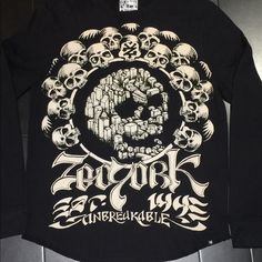 Here We Have A Brand New And Never Worn Zoo York Unbreakable Skulls Nyc L/S Muscle Tee In Size L. This Is A Very Unique Zoo York Piece, With All Kind Of Skulls Details. Retail Value Was $79. You Could Grab One Here For Much Less. Please Let Me Know If You Have Any Questions. Thanks. Long Sleeve Skull Print Tops For Streetwear, Long Sleeve Tops With Skull Print For Streetwear, Urban Skull Print Crew Neck Top, Skull Print Relaxed Fit Long Sleeve T-shirt, Long Sleeve Graphic Tee With Skull Print, Urban Cotton Tops With Skull Print, Edgy Long Sleeve T-shirt With Skull Print, Edgy Long Sleeve Skull Print T-shirt, Zoo York