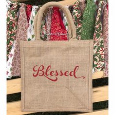 a burlock bag with the word, blessed on it