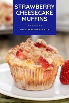 strawberry cheesecake muffins on a white plate with strawberries