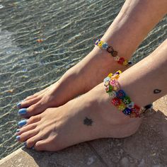 Handmade Millefiori Stretchy Flower Anklets Size: These are all made to about 9"Beads: 10~14mm *Price is for 1 anklet  *If you don't see what you want or need a different size, message me! I am happy to custom make an anklet for you! *Made from beads available in my store:)  Note: colors may differ depending on your monitor www.BettysGlassBeads.Etsy.com Colorful Beaded Anklets For Spring Gift, Spring Anklets With Colorful Beads, Spring Gift Anklets With Colorful Beads, Handmade Trendy Anklets For Spring, Trendy Handmade Anklets For Spring, Handmade Adjustable Anklets For Spring, Flower Shaped Anklets For Spring Gift, Flower Anklets For Spring, Perfect As A Gift, Trendy Multicolor Anklets For Spring