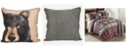 three pillows and two pillow cases with pictures of dogs on them, one is black and the other is brown