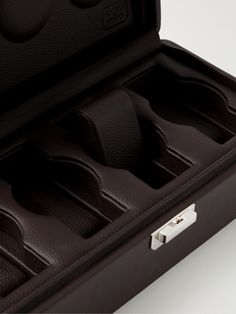 Scatola Del Tempo's watch boxes are a work of art. This version has been crafted in Italy from supple full-grain leather with four sections that are ergonomically designed to cradle each timepiece. Keep it displayed on your dresser so you can rotate through your favourites during the week. Elegant Leather Watch With Round Case, Luxury Cognac Cases For Formal Use, Luxury Cognac Cases For Formal Occasions, Elegant Leather Watch, Classic Box-shaped Watch Accessories For Business, Classic Business Watch Accessories Box, Luxury Formal Watch Accessories With Round Case, Luxury Round Case For Formal Occasions, Classic Formal Watch Accessories With Case