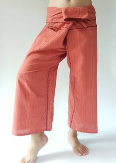 "Unisex Thai fisherman pants. One size fits all. You can wear in many occasions, casual wear, yoga wear, maternity wear, relax at home, travel etc. If you are looking for some pants that you can wear everywhere, comfortable, relax and Easy to wear. Thai fisherman pants is Answer!! Nice gift for yourself or your lover One pocket on the side for storing your items such as wallets, mobile phones, etc Approx. Measurements: One size can fits most and 1 Pockets Measurement Waist 27\" (69 cms) Length 4 High Waist Cotton Harem Pants For Beach, Cotton Yoga Parachute Pants, Cotton Parachute Pants For Yoga, Cotton Parachute Yoga Pants, Spring Cotton Yoga Bottoms, Spring Cotton Yoga Pants, Summer Yoga Capris With Pockets, Spring Yoga Bottoms In Cotton, Non-stretch Cotton Harem Yoga Pants