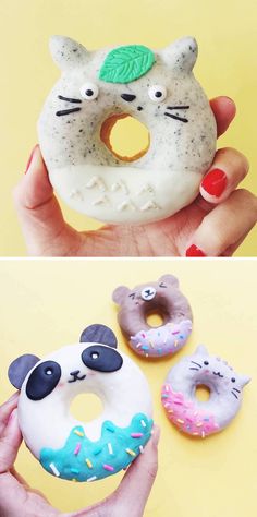 there are three donuts that have different designs on them, and one is made to look like a cat