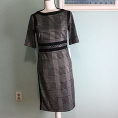 Nwt - An Elegant And Stylish Short Sleeve Day Dress, Featuring A Boat Neckline, Contour Sewing And All Over Houndstooth Print Patterns Details, 84% Polyester, 13% Rayon, 4% Spandex, Back Zipper Closure, Shoulder/Shoulder 15”, Chest Measurements 16” Flat, Shoulder To Hem 38”. Fitted Black Knee-length Plaid Dress, Elegant Fitted Black Plaid Dress, Knee-length Plaid Workwear Dresses, Knee-length Plaid Dress For Work, Elegant Fitted Plaid Dress With Short Sleeves, Elegant Fitted Plaid Work Dress, Plaid Knee-length Dress For Work, Knee-length Plaid Office Dress, Plaid Knee-length Office Dress