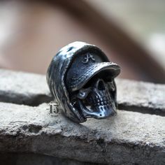 Handmade Rock n roll jewelry like you've never seen before. Grab yours NOW or cry later. Best attention to detail. Article name : RAP BOY Environmentally friendly metal made with passion and great attention to detail 🔨 Very comfortable to wear daily and in any occasion 🖤💍 Shipped from Jakarta, Indonesia Standard shipping use USPS ( US Customers ) Singapore post ( Rest of the world ) Express shipping use DHL Express Note : Please put a phone number in a note for DHL Express, it needs to requir Collectible Silver Skull Ring With Oxidized Finish, Adjustable Gothic Skull Ring Collectible, Hand Cast Metal Skull Ring For Gift, Collectible Hand Cast Skull Rings, Engraved Metal Skull Ring As A Gift, Vintage Adjustable Silver Skull Ring, Handmade Metal Skull Ring Collectible, Silver Skull Ring Collectible, Adjustable Silver Skull Ring Collectible