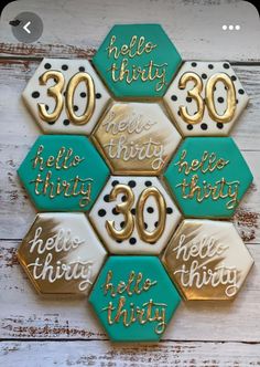 some cookies that are shaped like hexagons with the words hello thirty on them