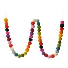 a multicolored beaded necklace hanging from a string on a white background with clippings