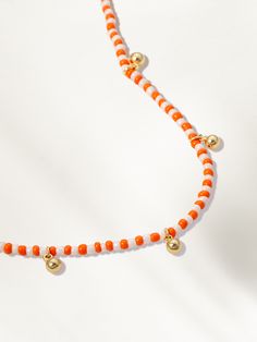 Wear a piece of the sunset with this colorful beaded bracelet. Crafted with orange and white beads, along with gold dangles, this is the ultimate summer bracelet. For a full look that’s bursting with color, pair this beaded bracelet with anything from our collection of colorful jewelry. Uncommon James, Gold And Orange, Summer Bracelet, Orange Bracelet, Summer Bracelets, Colorful Jewelry, Full Look, Gift Exchange, Jewelry Cleaner