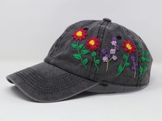 Flower is 100% hand embroidered on a 100% cotton wash black baseball cap. Hat is one size fits all with adjustable back strap. Unique cap, one of a kind! I am also open for customization. If you want the item in different colors, please message me, it will take additional 2-3 days of handling time. Free first class shipping, upgradable priority mail service. 30 days return policy, feel confident at your purchase! Adjustable Baseball Cap With Multicolor Embroidery, Floral Embroidery Adjustable Snapback Baseball Cap, Adjustable Multicolor Embroidered Baseball Cap With Curved Brim, Adjustable Floral Embroidered Snapback Baseball Cap, Adjustable Floral Embroidery Snapback Baseball Cap, Casual Hats With Multicolor Floral Embroidery, Embroidered Flower Baseball Cap, One Size, Adjustable Multicolor Embroidered Baseball Cap, Adjustable Floral Embroidery Baseball Cap