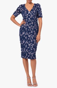 Sweetly stitched blooms cover every lovely inch of a fitted sheath cut to a beloved and versatile midi length. 40" length (size 8) Hidden back-zip closure V-neck Short sleeves Lined 95% polyester, 5% spandex Dry clean Imported Elegant Knee-length Floral Applique Midi Dress, Elegant Knee-length Midi Dress With Floral Applique, Spring Knee-length Midi Dress For Mother Of The Bride, Fitted Floral Embroidered Midi Dress For Formal Occasions, Fitted Midi Dress With Floral Applique For Formal Occasions, Formal Fitted Midi Dress With Floral Applique, Formal Fitted Floral Embroidery Midi Dress, Formal Fitted Midi Dress With Floral Embroidery, Fitted Knee-length Midi Dress With Floral Embroidery