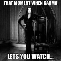 a woman standing in front of a mirror with the caption that moment when karma lets you watch