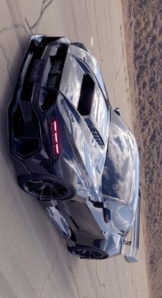 an aerial view of a futuristic sports car