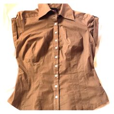 Nwot Capped Sleeved Button Down 2b Bebe Top In Brownie Color. Stretchy Fit 3% Spandex 97% Cotton. Body Hugging And Thick Stretchy Material Makes It Very Figure Flattering. Also In Melon Color Size Med Nwt In Pictures For Reference Only (Separate Listing). Bundle For Discounts!! Brown Tops With Button Closure For Work, Brown Button Closure Tops For Work, Brown Workwear Tops With Button Closure, Classic Brown Tops With Button Closure, Brown Collared Top With Button Closure, Brown Buttoned Top For Office, Brown Cotton Top For Office, Brown Cotton Office Top, Brown Cotton Tops For Office