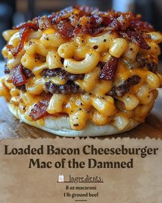 the loaded bacon cheeseburger macaroni and cheese is on top of a piece of parchment paper