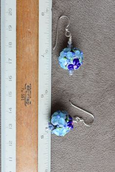 Raised Blue Flowers Lampwork Earrings, Blue Raised Floral Lampwork Bead Earrings, Blue Flowers for Your Ears Sterling Earwires - Etsy Blue Wire-wrapped Glass Earrings, Blue Wire Wrapped Glass Earrings, Blue Glass Wire Wrapped Earrings, Blue Flower Earrings For Jewelry Making, Blue Wire Wrapped Beaded Earrings, Blue Wire Wrapped Round Beaded Earrings, Blue Round Wire Wrapped Beaded Earrings, Blue Beaded Adjustable Flower Earrings, Blue Adjustable Nickel-free Flower Earrings