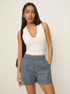 For when the temps go up.  Shop the Billy Short from Reformation, a high rise boxer style short with a button front and elastic waistband. Time Clothes, Genetically Modified, Swimwear Dress, A Button, Go Up, New Tops, Linen Clothes, Outerwear Sweater, Oversized Shirt