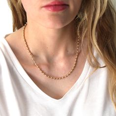 This beaded silver or gold chain necklace, perfect for layering or a minimalist look.•Beaded by hand with 4mm beads •Choose 14kt gold filled, sterling silver or mixed (silver beads and gold accents) Water friendly Beaded Necklaces With Delicate Chain And Round Beads, Everyday Beaded Necklaces With Delicate Chain, Everyday Beaded Necklace With Delicate Chain, Yellow Gold Necklaces With Tiny Beads For Everyday, Dainty Everyday Necklace With Beaded Chain, Minimalist Gold Beaded Necklaces For Everyday, Minimalist Single Strand Gold Beaded Necklace, Gold Minimalist Single Strand Beaded Necklace, Minimalist Gold Single Strand Beaded Necklace