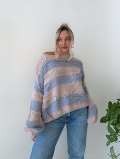 Details: Stripe sweater Knit Oversized fit Bubble sleeve Round neck Size + Fit: Model is 5'4 Wearing size S/M Fabric + Care: 80% acrylic 20% nylon Shipping + Return: Free US ground shipping on orders $100+ We offer free returns and a refund in the form of store credit with items not worn within 10 days of delivery For more info on returns visit our returns page Blue Cozy Knit Cropped Sweater, Cozy Blue Knit Cropped Sweater, Blue Oversized Chunky Knit Sweater, Oversized Blue Chunky Knit Sweater, Blue Chunky Knit Long Sleeve Sweater, Blue Soft Knit Acrylic Sweater, Oversized Blue Knit Sweater, Cozy Blue Acrylic Sweater, Oversized Blue Cropped Sweater