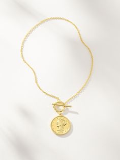 Baja Necklace | Gold | Product Image | Uncommon James Gold Medallion Necklace With Delicate Chain For Everyday, Everyday Gold Medallion Necklace, Toggle Necklace With Coin Pendant, Minimalist Everyday Coin Necklaces, Minimalist Everyday Coin Necklace, Chain Necklace With Coin Pendant For Layering, Minimalist Chain Necklace With Coin Pendant, Gold Coin Necklace With Adjustable Chain For Everyday, Everyday Coin Pendant Necklace With Delicate Chain