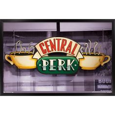 the sign for central perk coffee is displayed