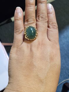 You are viewing a beautiful 14k mings green translucent jade cabochon ring. The total weight of the ring is approx.8.6 grams. The ring size approx.5 3/4 can size up or down. The ring itself measures approx.21mm x 19mm wide. Beautiful green jade translucent cabochon. Send me a message if you have any question. MAKE AN OFFER Yellow Gold Jade Cabochon Ring, Green Emerald Oval Cabochon Ring Stamped 14k, Gold Jade Cabochon Rings, 14k Gold Green Gemstone Dome Ring, Gold Rings With Jade Cabochon, Cabochon Ring, Ring Photos, Jade Pendant, Green Jade