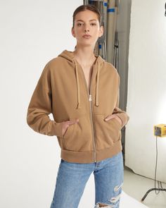 Enjoy maximum chill in our Finley Drop Shoulder Zip Front Hoodie. Whether you're on-the-go or lounging at home, you'll never want to take this plush cozy off. Hooded Exposed zipper front closure Functional front slant pockets Ribbed trim on hem and sleeve cuffs Relaxed Fit Brushed back fleece interior 85% Cotton, 15% Polyester Model is 5’10” and wearing a size S. This style runs true to size. We would recommend taking your regular size. Brown Fleece Hoodie With Ribbed Cuffs, Cozy Brown Hoodie With Fleece Lining, Casual Pink Hoodie With Zipper Closure, Half-zip Sweatshirt With Zipper Closure For Loungewear, Brown Fleece-lined Hoodie Outerwear, Marissa Webb, Exposed Zipper, Front Zipper, Drop Shoulder