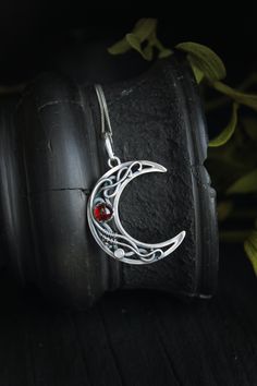 ITEM DESCRIPTION: The size of this circle pendant H 4 cm x W 3 cm. Weight - 4g. You can buy this necklace with a chain or without and with different stones. Jewelry will come to you in a gift box - ready for gift giving. I made this moon necklace of sterling silver, red garnet, and tiny labradorite. I think this color combination is very elegant and luxurious! The parcel will be sent 1-2 days after payment. Delivery usually takes 10-21 days. But in the period from December to February this may t Spiritual Moon Charm Pendant Jewelry, Spiritual Sterling Silver Moon Phase Necklace, Celestial Necklace With Large Round Pendant, Celestial Crescent Gemstone Jewelry, Celestial Style Necklace With Large Round Pendant, Sterling Silver Moon Charm Pendant Necklace, Sterling Silver Pendant Necklace With Moon Charm, Celestial Moon Charm Pendant Jewelry, Celestial Style Moon Charm Pendant Jewelry