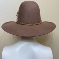 Mexican Handcrafted Wide Brim Cowboy Hat | Lucky7 Tobacco Just Different! A complete head-turner & unique Men & Women Mexican artisan hat on this wool felt Tejana-form in Tobacco color with its 7 symbolical Gold-dipped accessories, steel accessories, & leather hat-band. SIZE See “Size Chart” below, or CLICK HERE DETAILS Sombrero Box Inner-elastic band (comfortable sizing) Brown Curved Brim Top Hat For Kentucky Derby, Brown Top Hat With Curved Brim For Western-themed Events, Brown Curved Brim Top Hat For Western-themed Events, Brown Short Brim Felt Hat For Kentucky Derby, Brown Flat Brim Felt Hat For Kentucky Derby, Brown Wool Felt Hat With Flat Crown, Brown Wool Felt Hat For Kentucky Derby, Artisan Brown Top Hat For Rodeo, Brown Felt Hat For Rodeo And Kentucky Derby