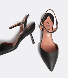 The everyday heel is a sophisticated style you can wear from desk to dinner. It was designed to be effortless, minimal and simplistic. The everyday heel features a front strap and is adorned with the 'VICE VERSA' signature split between the two shoes. ‍ ‍ Best Heels, Everyday Heels, Strap High Heels, Fits Inspo, Best Black, Zambia, Seychelles, Papua New Guinea, Equatorial Guinea