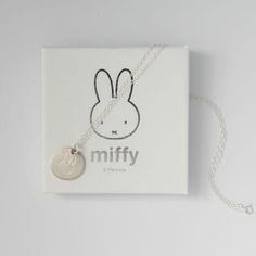 * Our Miffy Personalised Disc Necklace is understated, simple and sophisticated, making your moments memorable. * This minimal Miffy disc pendant has been handcrafted in sterling silver and will beautifully catch the light whenever you wear it.  * This personalised necklace makes the perfect base for layering and is suspended from a fine sterling silver necklace. *Please note: that the number of characters on an engravable item is limited to six or ten characters or one date. Please see our illustrations, and if in doubt, do email us to check. If you choose the Birth sign, no other engraving can be added due to space.  Material: Sterling Silver Colour Silver Chain length & style: 45cm Disc Charm:  Secure clasp fastening Hand-engraved in our London workshop Sent with love in a Miffy gift bo Miffy Merchandise, Minimalistic Pendant, Body Necklace, Personalised Necklace, Top Background, Cover Background, Disc Pendant, Disc Necklace, Recycled Sterling Silver