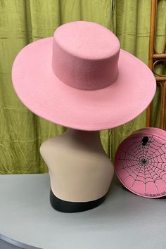 This fab wool hat features a lovely pink color with a black ribbon tie. Very high quality wool. Large wool hat with black ribbon tie. Brim is 4.33" Imported. Twirl Skirt, Button Earrings, Pink Ties, Black Felt, Ribbon Tie, Black Ribbon, Wool Hat, Dress Fabric, Sales Gifts