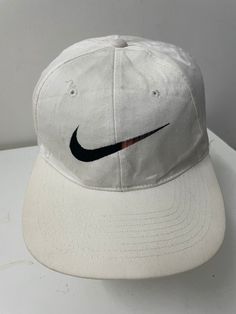 Details Item Brand : Nike Condition :Good Size : One Size Fit All Every purchasing will get free gift from us. Please read our shop policies carefully before buying.. Thanks for visit our shop. color may be slightly different from the original color due to lighting and background factors Casual White Snapback Cap, Casual Snapback Hat With Logo, Casual White Snapback Hat For Outdoor, White Casual Snapback Hat For Outdoor, White Casual Snapback Hat For Sports, Casual White Snapback Sports Hat, Casual Breathable Baseball Cap For Streetwear, Urban White Baseball Cap For Sports, Casual Outdoor Hats With Logo