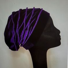 Dark Purple Stretch Velvet Beanie Hat With Merrowed Seams. Nicely Lined With A Colorful Stretch Print. Beautifully Handmade, The Perfect Gift For Her. A Soft Hat Easy To Shape To Your Liking. Add A Brooch Or A Flower To Create Your Own Style. A Slouchy, Scrunchie, Hat With Light Weight Warmth That Can Be Worn Comfortably Inside And Yet Warm Enough In Cold Weather. Can Be Worn For Most Occasions. You're Sure To Get Plenty Compliments! A Unique Gift For Most Occasions! One Size Fit Most!! *Easy We Purple Beanie Hat, One Size, Purple One Size Beanie Hat, Adjustable Trendy Bonnet One Size, Purple One Size Fits Most Bonnet, One Size Purple Cap, Purple One Size Cap, Trendy Purple Beanie Hat, Purple Bucket Hat, One Size, Purple Bucket Hat One Size