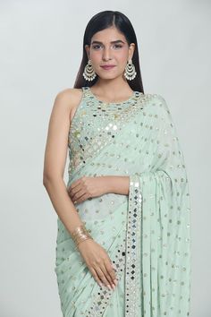 Sea green saree with all-over sequins buttis and sheesha hand embroidered borders. Comes with coordinating embroidered and padded blouse. - Aza Fashions Sea Green Saree, Dhoti Saree, Mirror Work Saree, Cotton Sarees Handloom, Padded Blouse, Green Saree, Lehenga Saree, Blouse For Women, Work Sarees