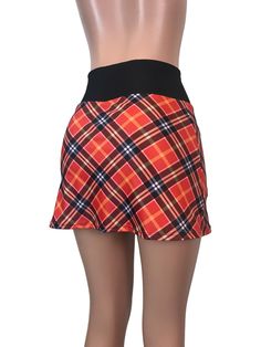 Step up your game in this fun and colorful athletic skirt with built in compression shorts and pocket. This golf, tennis, running or sports skirt is slim-style, but allows for plenty of movement, made of a red plaid high quality performance spandex. The compression shorts are uniquely designed to be incredibly comfortable and won't ride up during activity. The pocket is positioned on the side of the shorts, and will fit your phone, keys, ID, etc. *Please see size chart in images above for standa Fitted Mini Skirt With Built-in Shorts For Cheerleading, Sporty Fitted Swim Skirt, Fitted Skirted Swim Skirt For Sports, Sporty Mini Skirt With Built-in Shorts For Cheerleading, Casual Mini Skirt With Built-in Shorts For Cheerleading, Fitted Casual Tennis Skirt For Cheerleading, Cheerleading Mini Skort With Built-in Shorts, Stretch Short Mini Skirt For Cheerleading, Casual Fitted Swim Skirt For Sports