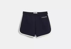 COACH® | Essential Retro Sweatshorts Stretch Cotton Ribbed Shorts, Cotton Shorts With Contrast Trim, Spring Bottoms With Contrast Trim And Stretch Fit, Spring Cotton Bottoms With Contrast Trim, Cotton Shorts With Contrast Trim For Summer, Casual Cotton Shorts With Ribbed Details, Trendy Stretch Cotton Shorts, Navy Cotton Athleisure Bottoms, Classic Fitted Bottoms With Ribbed Waistband