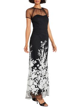 Delicately shirred mesh gives way to a bounty of blooms in this enchanting gown that will get glasses raised. 58 1/2" length (size 8) Hidden back-zip closure Jewel neck Short sleeves Partially lined 100% polyester Dry clean Imported White Floral Print Evening Dress, White Floral Print Evening Gown, Black Floral Print Gown For Gala, Black Floral Print Maxi Dress For Wedding, White Floral Evening Gown, Summer Formal Full-length Gown, Black Floor-length Gown With Floral Print, Black Floral Print Evening Gown, Black Floral Print Floor-length Gown